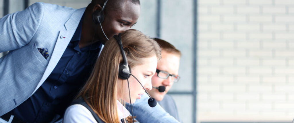 recruiters huddled at desk