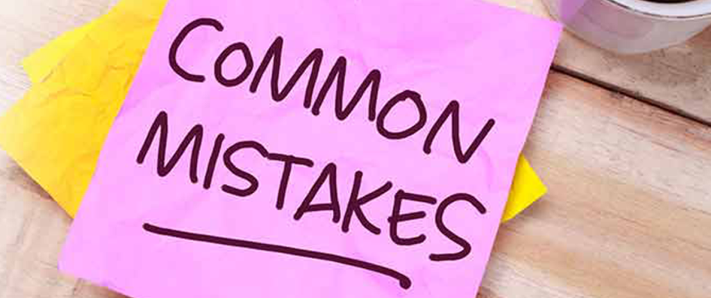 common mistakes written on a post it note