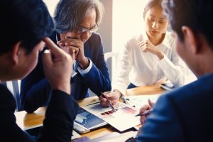 The business team is meeting with stress