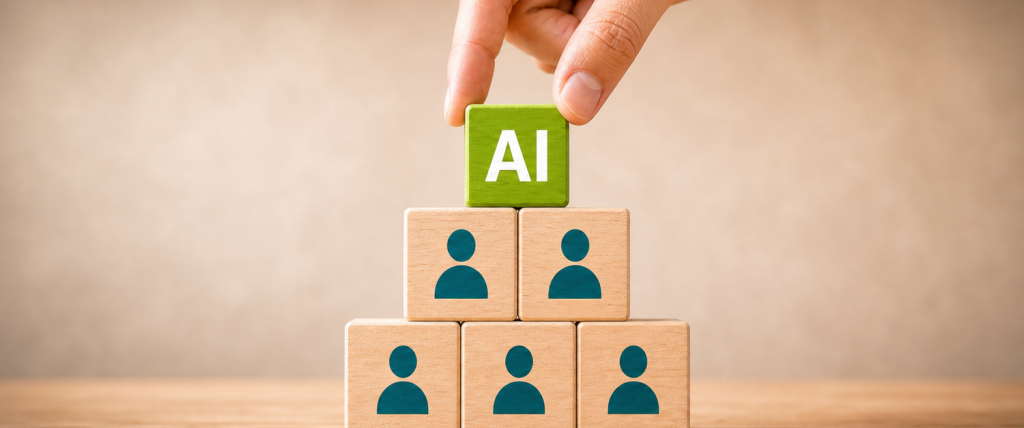 Team-building pyramid of wooden blocks with teal person icons; a green AI block is being placed on top by fingers, symbolizing AI-powered teamwork.